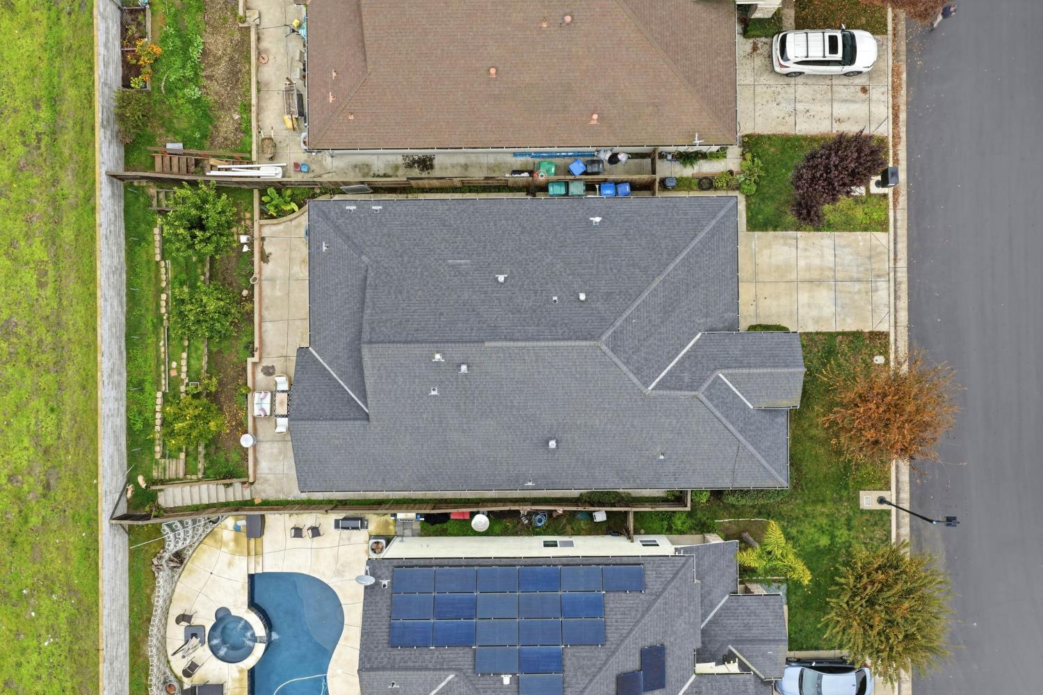 10250 Rudder Way Stockton, CA 95209 - Photo 37 of 46 an aerial view of a house with a yard and a car parked