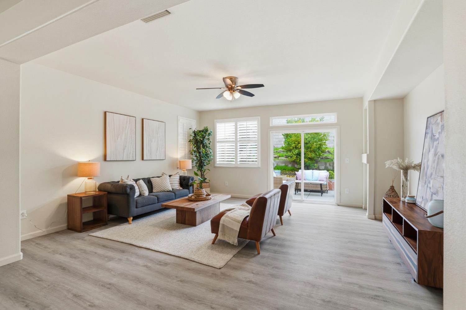 10250 Rudder Way Stockton, CA 95209 - Photo 8 of 46 a living room with furniture large window and wooden floor
