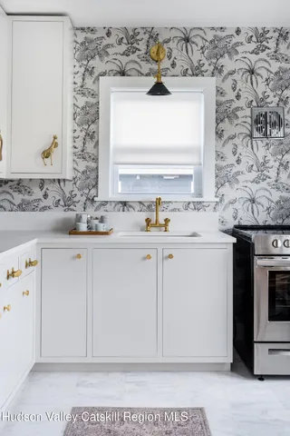 a bathroom with a bathtub and a sink