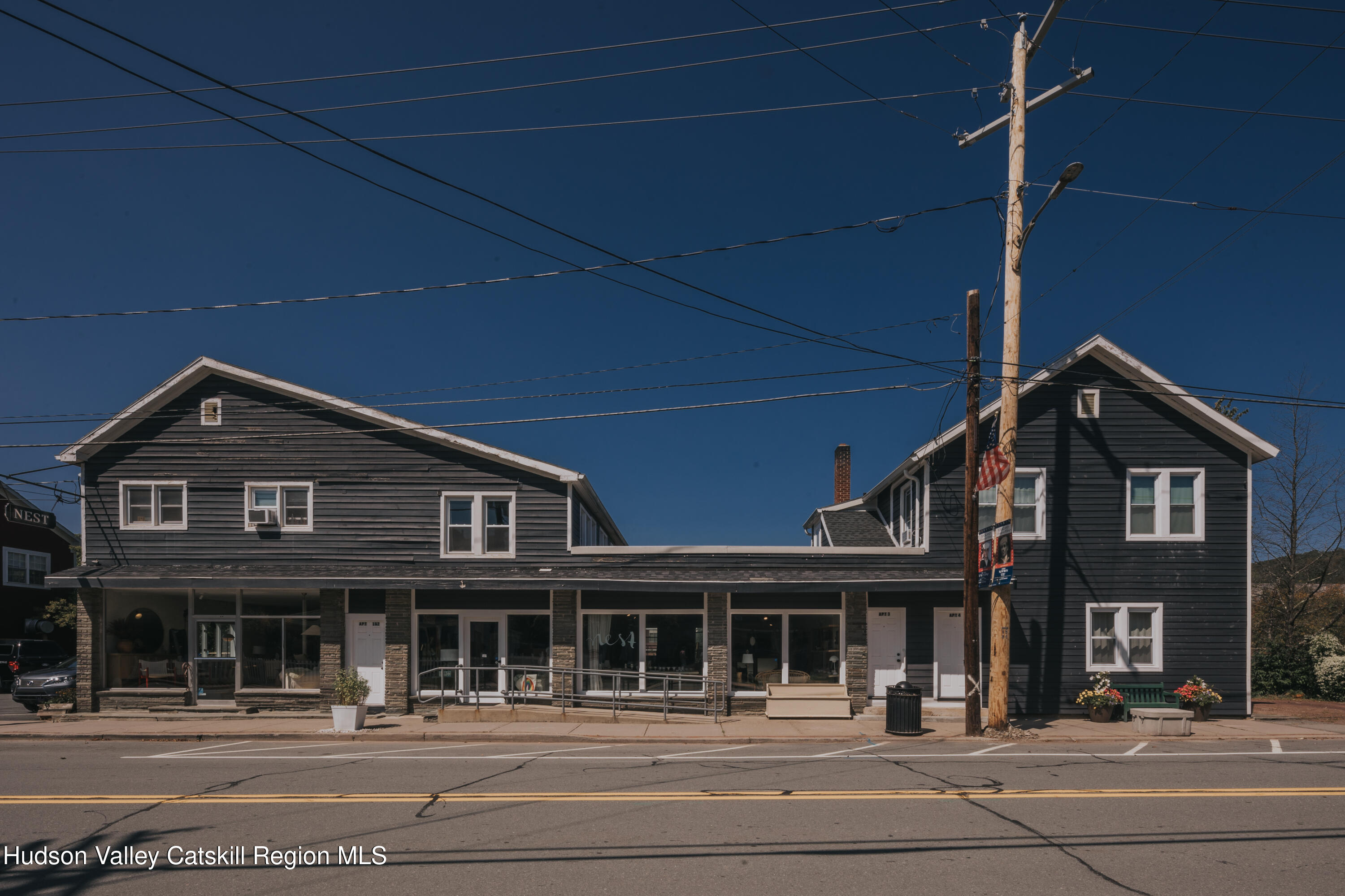 34 Main Street Livingston Manor, NY 12758 - Photo 4 of 20 a front view of a building with a street