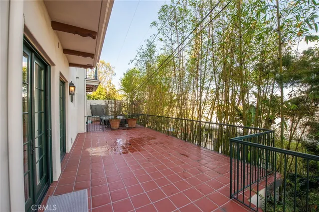 a view of a building with a bench in front of building