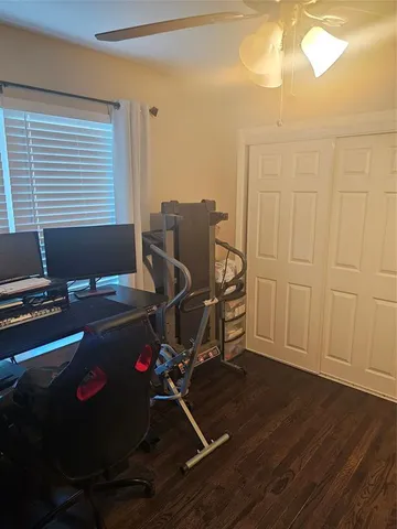 a room with furniture and a flat screen tv