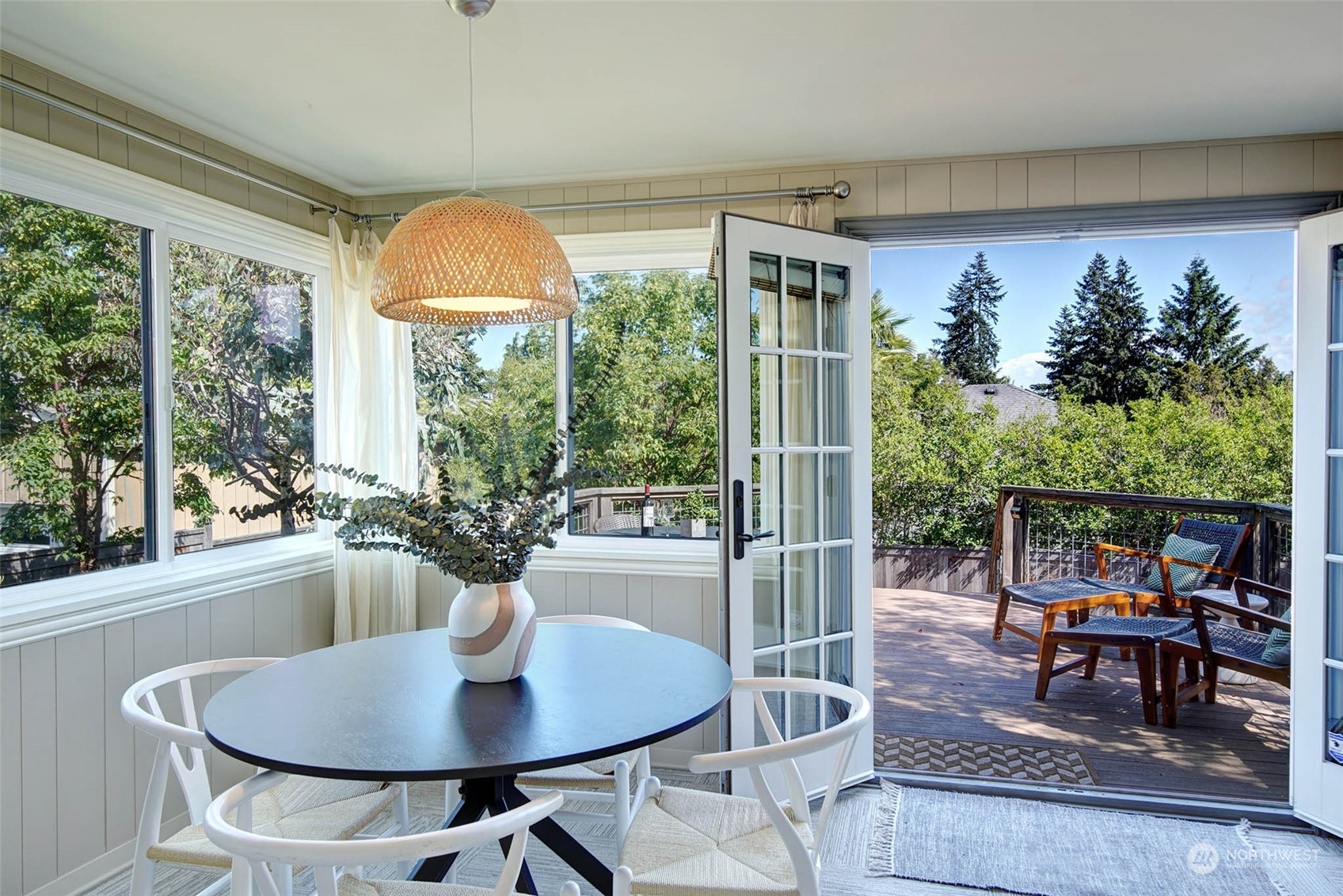 4100 Southwest Ida Street Seattle, WA 98136 - Photo 13 of 32 a dining room with furniture wooden floor and a potted plant