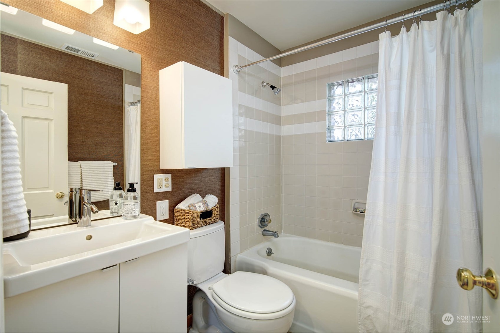 4100 Southwest Ida Street Seattle, WA 98136 - Photo 18 of 32 a bathroom with a sink toilet a shower and a mirror