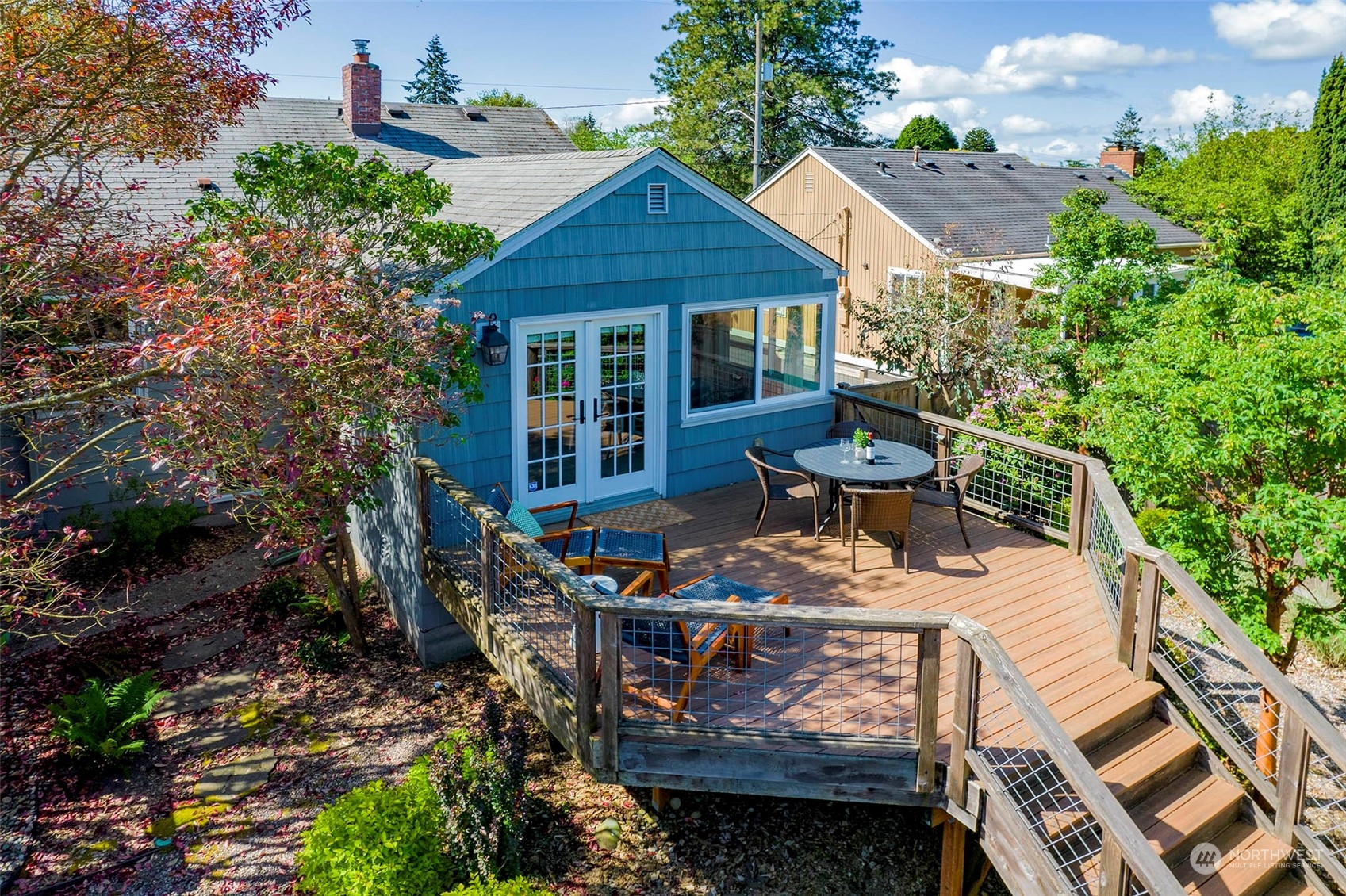 4100 Southwest Ida Street Seattle, WA 98136 - Photo 24 of 32 a view of a patio with furniture and a garden