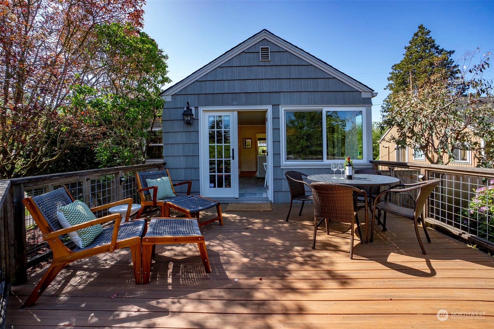 4100 Southwest Ida Street Seattle, WA 98136 - Photo 27 of 32 a view of a wooden chairs and table in the patio