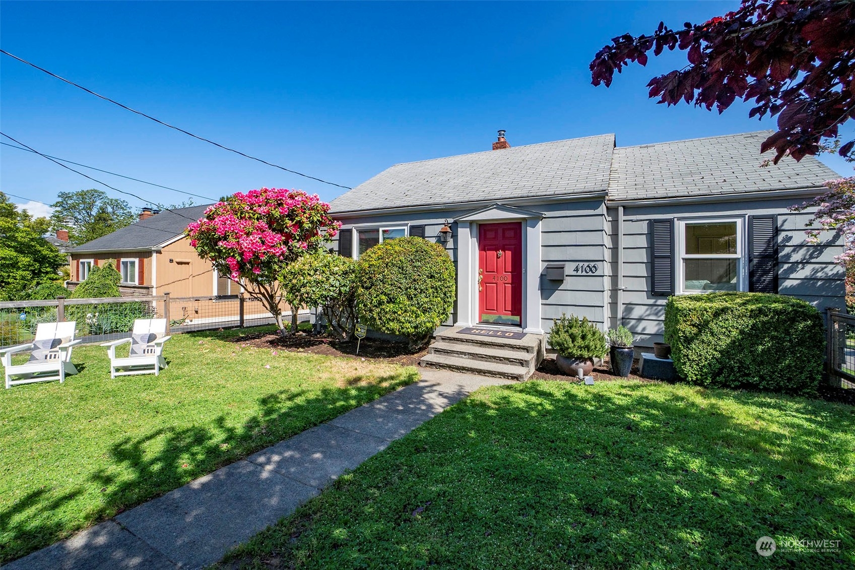 4100 Southwest Ida Street Seattle, WA 98136 - Photo 31 of 32 a front view of a house with a yard