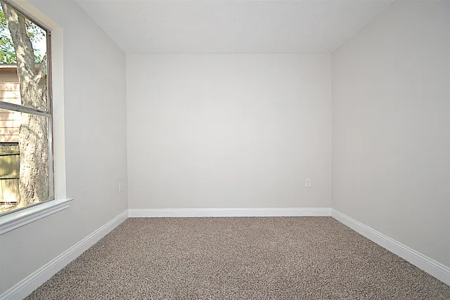 an empty room with a window