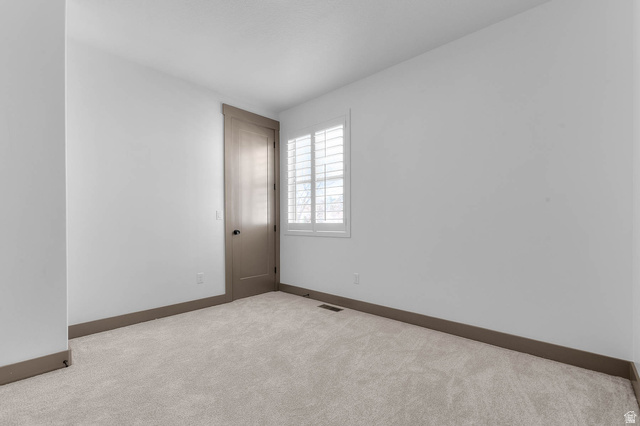 2724 Mt Jordan Road Sandy, UT 84092 - Photo 21 of 33 Spare room with baseboards and carpet flooring