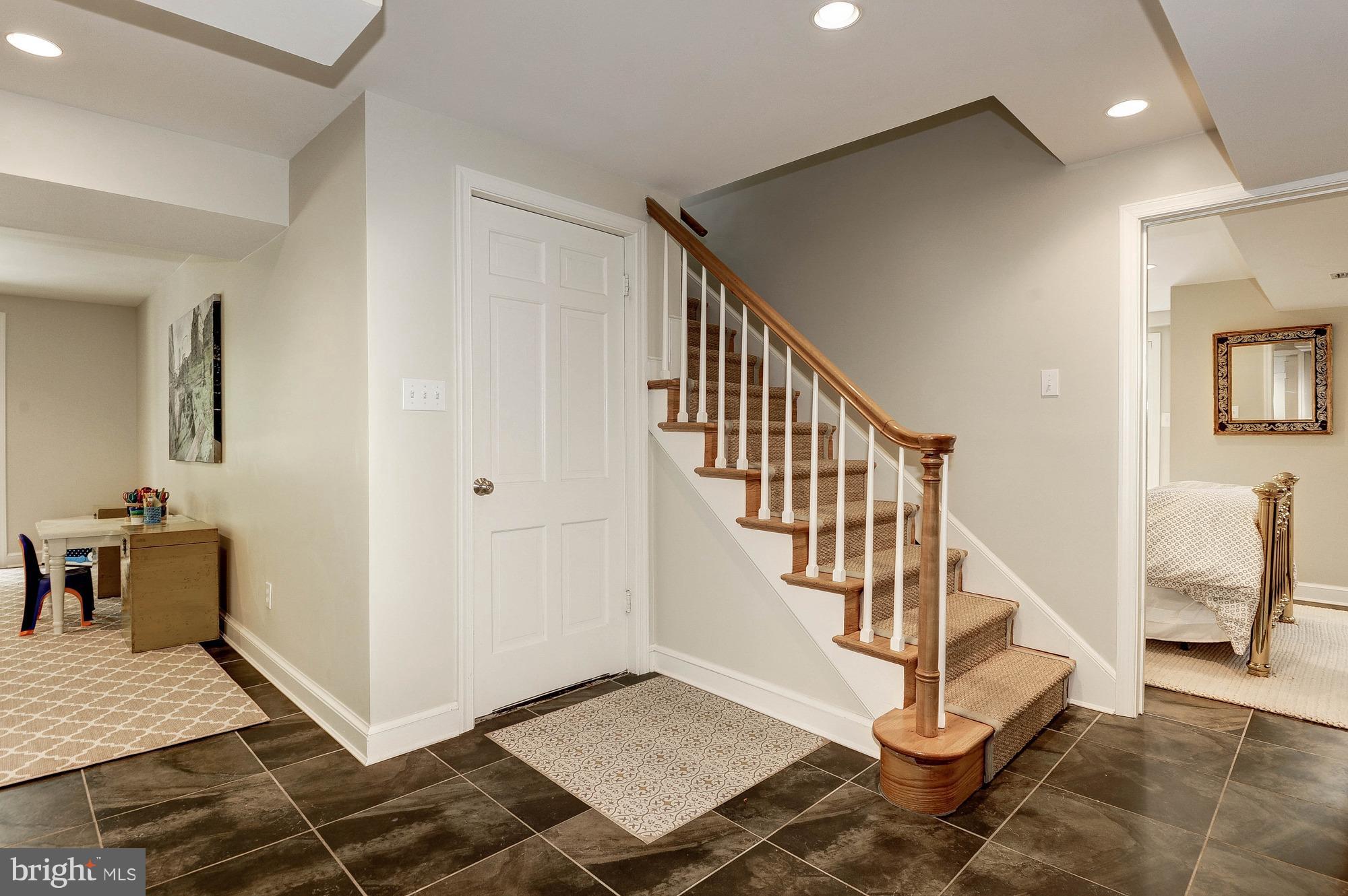 5120 Upton Street Northwest Washington, DC 20016 - Photo 14 of 22 a view of entryway and hall with dining room