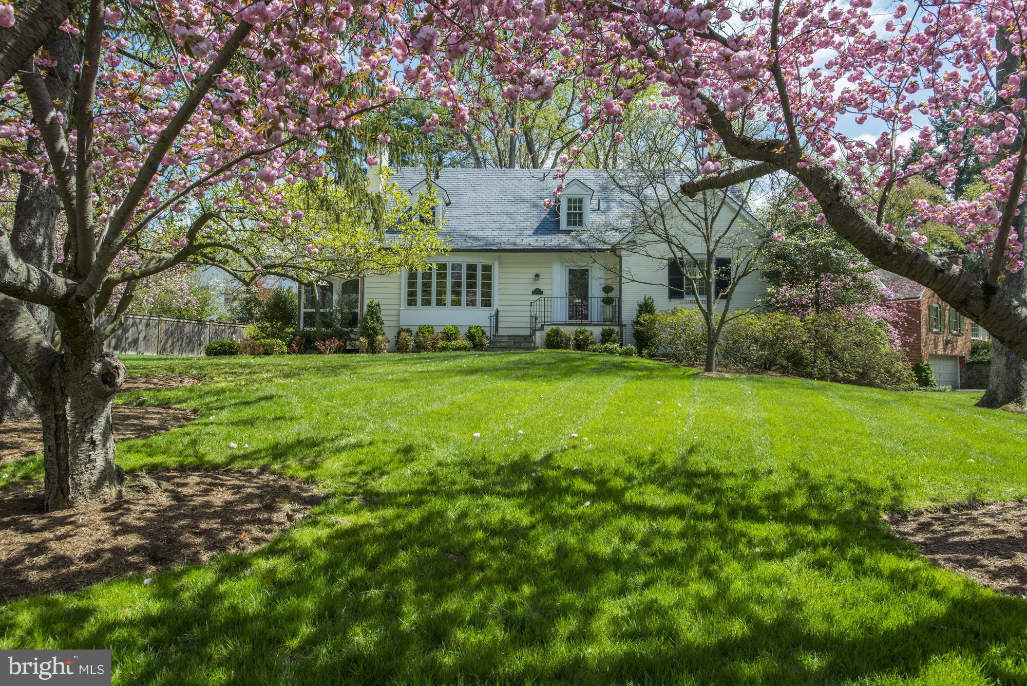 5120 Upton Street Northwest Washington, DC 20016 - Photo 20 of 22 a view of a big yard next to a house