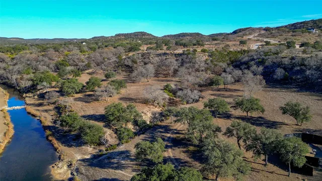 an aerial view of mountain and tree