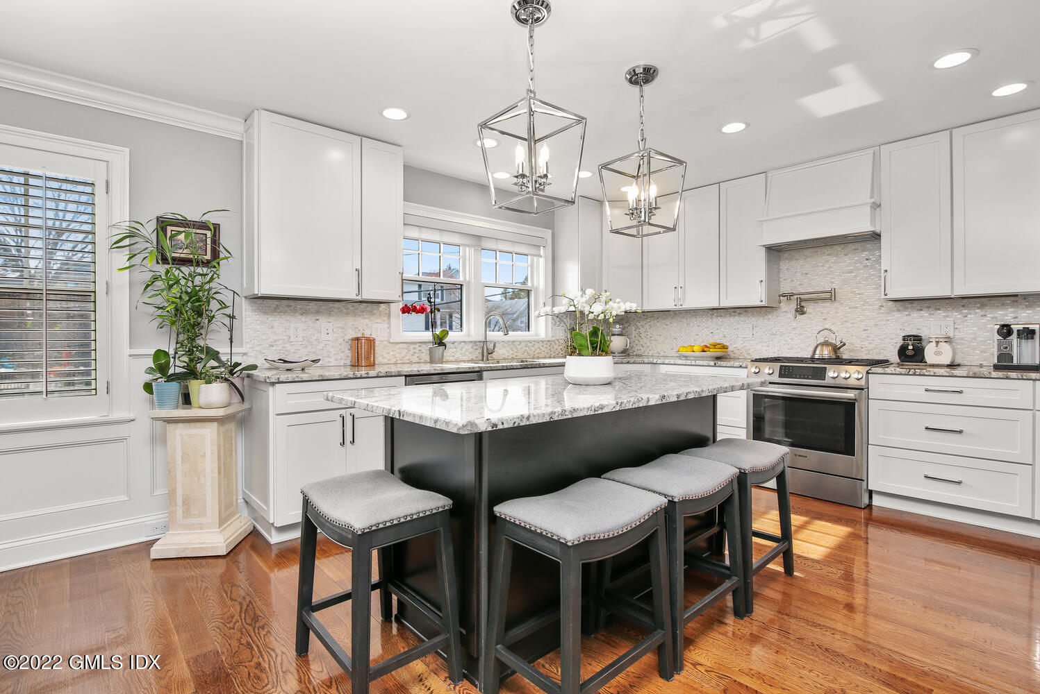 24 Harold Street, Unit C Cos Cob, CT 06807 - Photo 12 of 32 a kitchen with a sink cabinets and window