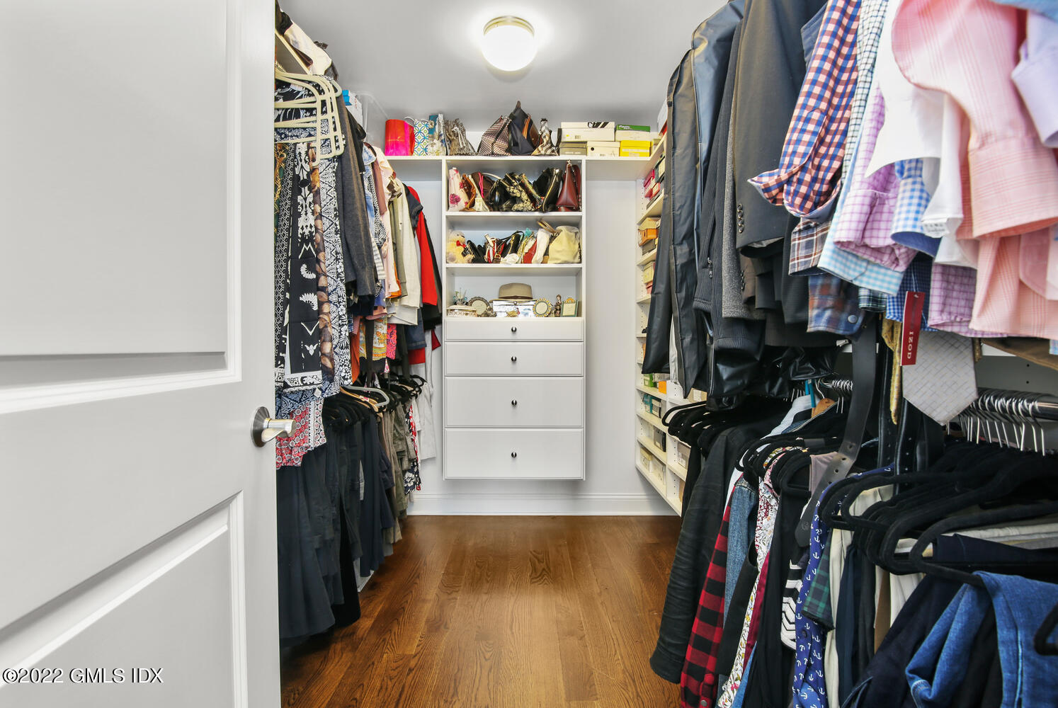 24 Harold Street, Unit C Cos Cob, CT 06807 - Photo 18 of 32 a view of walk in closet with clothes