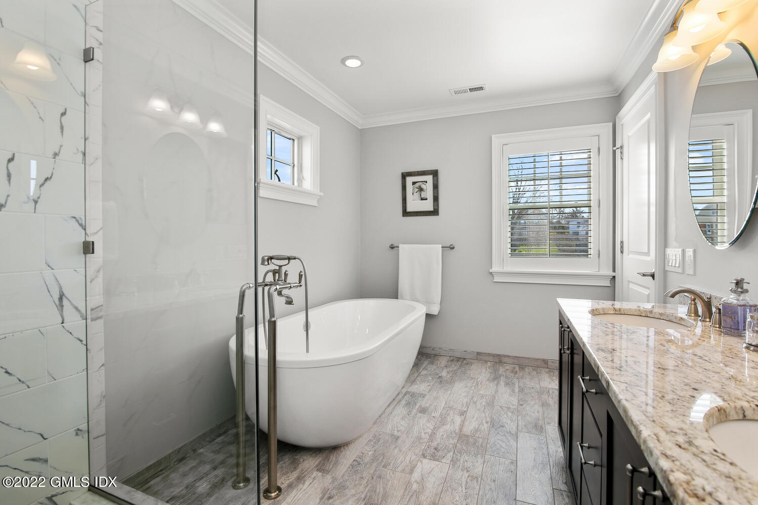 24 Harold Street, Unit C Cos Cob, CT 06807 - Photo 19 of 32 a spacious bathroom with a bathtub sink and toilet