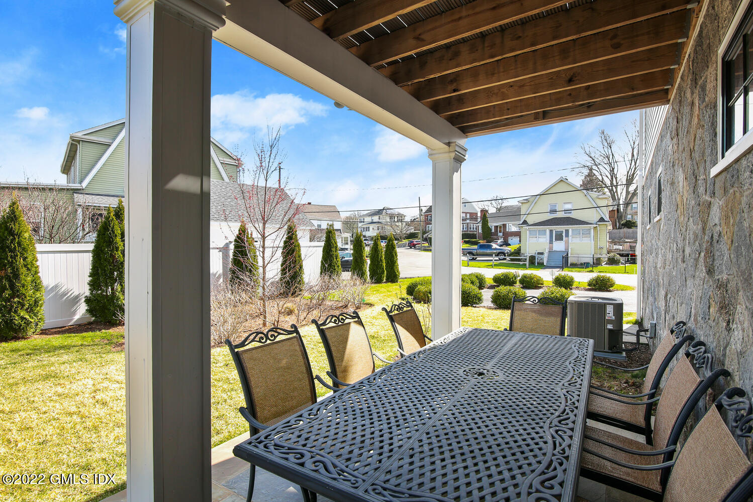 24 Harold Street, Unit C Cos Cob, CT 06807 - Photo 25 of 32 a view of a patio with table and chairs
