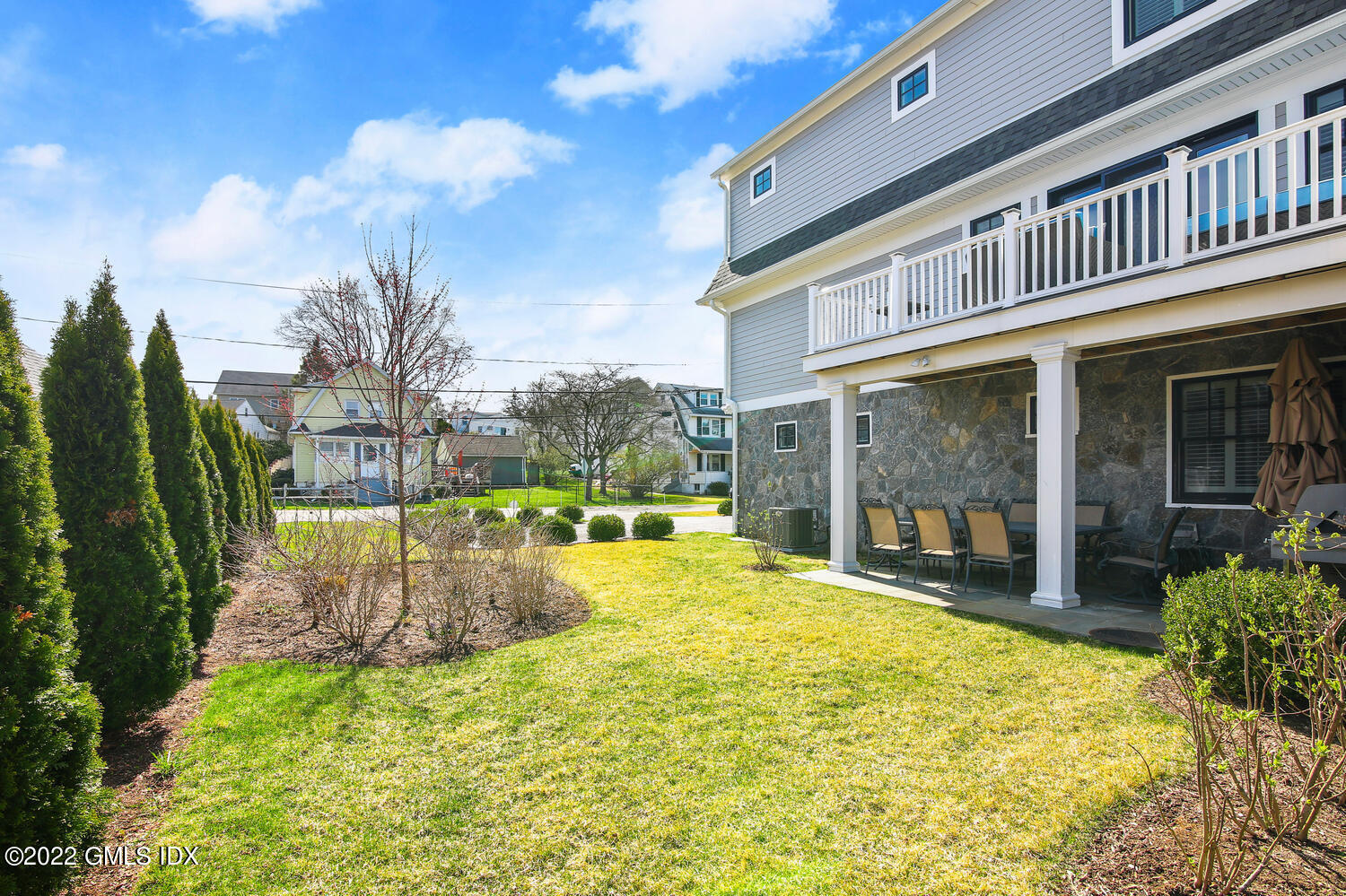 24 Harold Street, Unit C Cos Cob, CT 06807 - Photo 26 of 32 a view of a house with a swimming pool