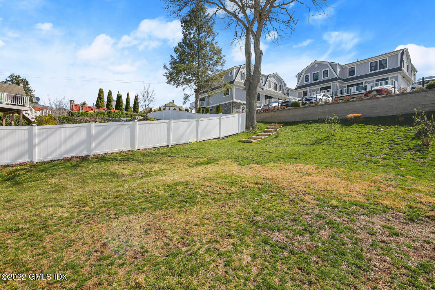 24 Harold Street, Unit C Cos Cob, CT 06807 - Photo 28 of 32 a view of a garden with houses