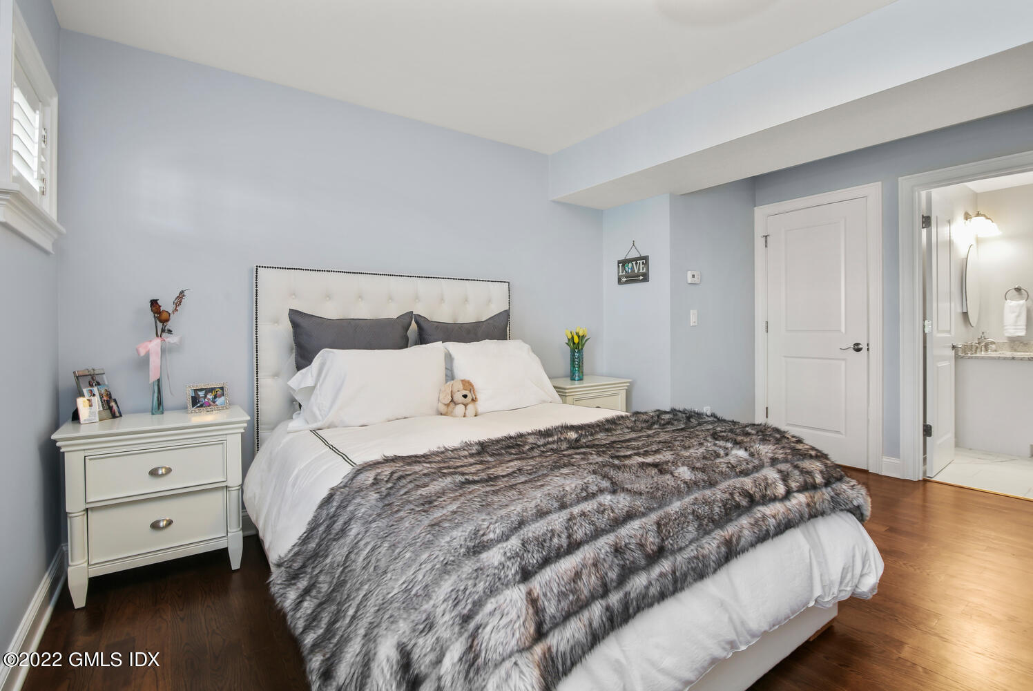 24 Harold Street, Unit C Cos Cob, CT 06807 - Photo 5 of 32 a bedroom with a bed and a window
