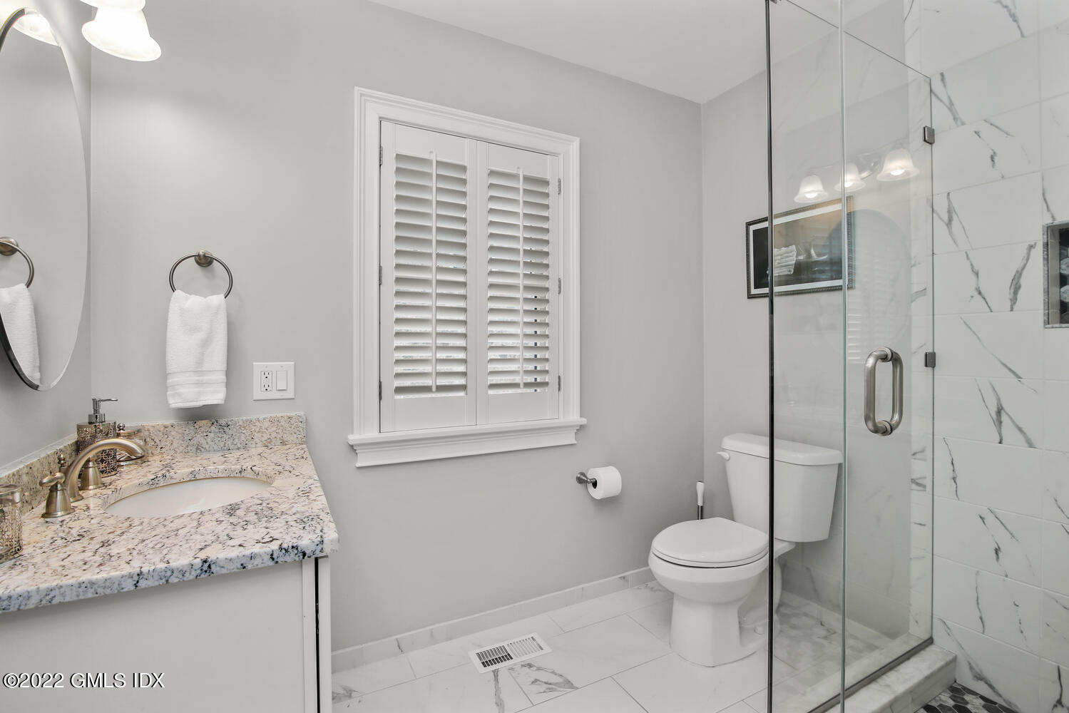 24 Harold Street, Unit C Cos Cob, CT 06807 - Photo 6 of 32 a bathroom with a granite countertop sink toilet and shower