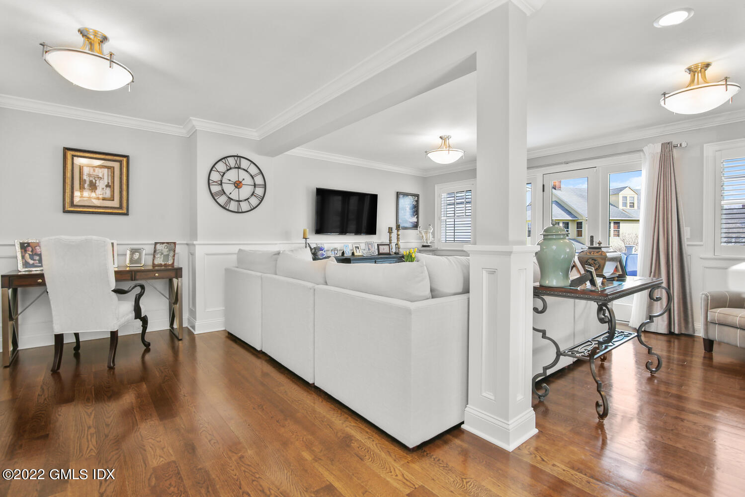 24 Harold Street, Unit C Cos Cob, CT 06807 - Photo 7 of 32 a living room with furniture and a flat screen tv