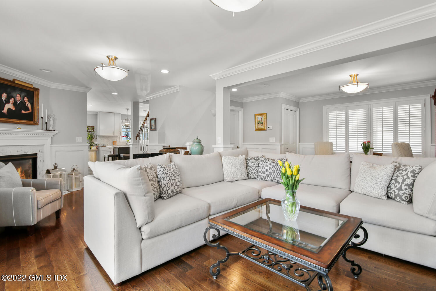 24 Harold Street, Unit C Cos Cob, CT 06807 - Photo 8 of 32 a living room with furniture and a fireplace
