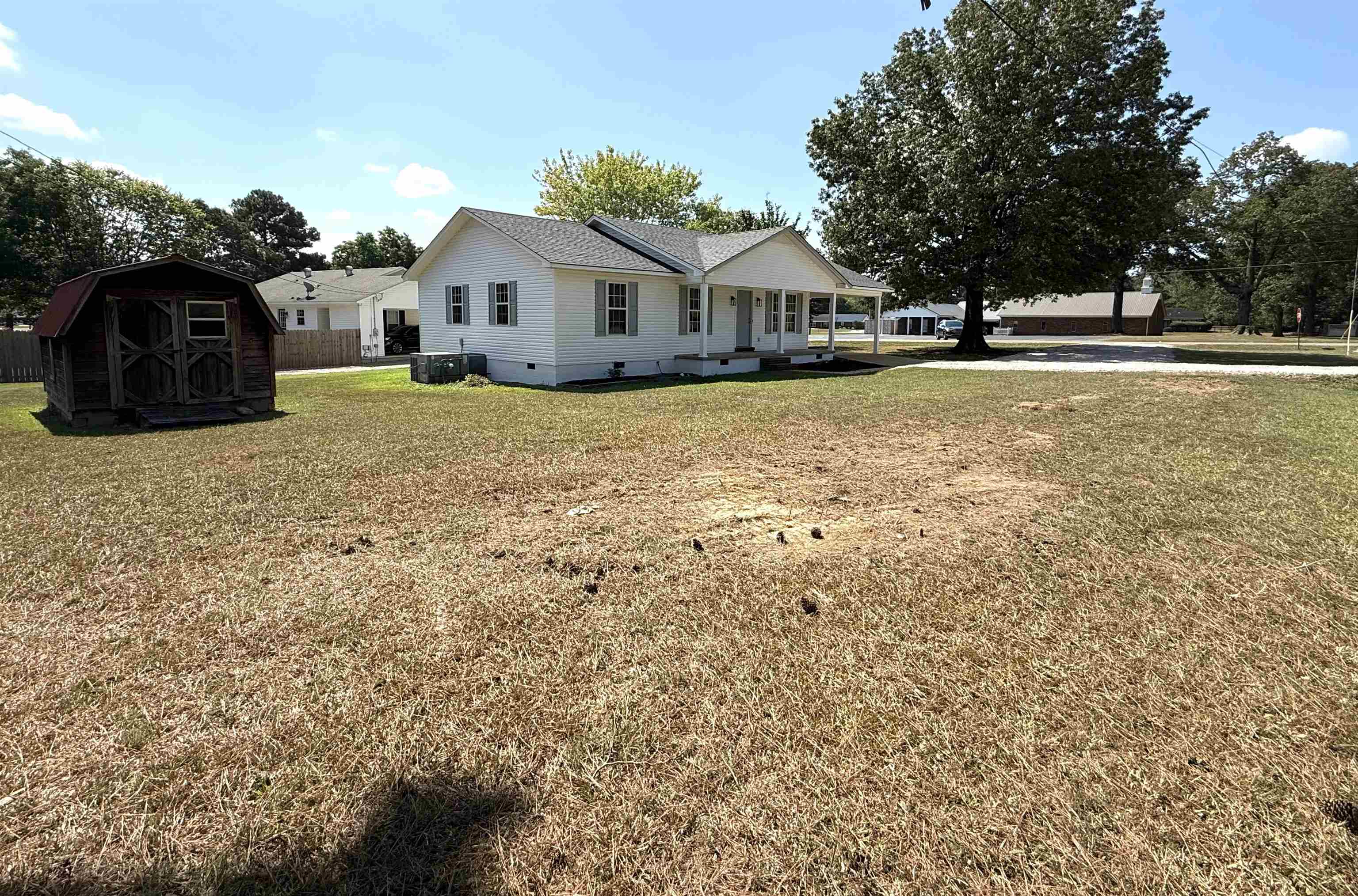 1250 Clifton Road Savannah, TN 38372 - Photo 28 of 33 View of front of home featuring crawl space, a storage shed, and a porch