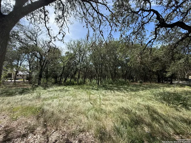 a fire hydrant in the middle of a field