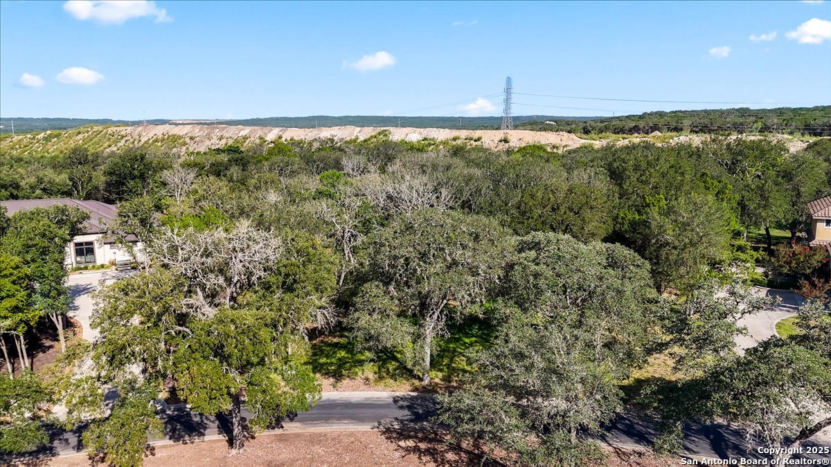 8403 Wild Wind Park Garden Ridge, TX 78266 - Photo 13 of 16 a view of an outdoor space and a lake view