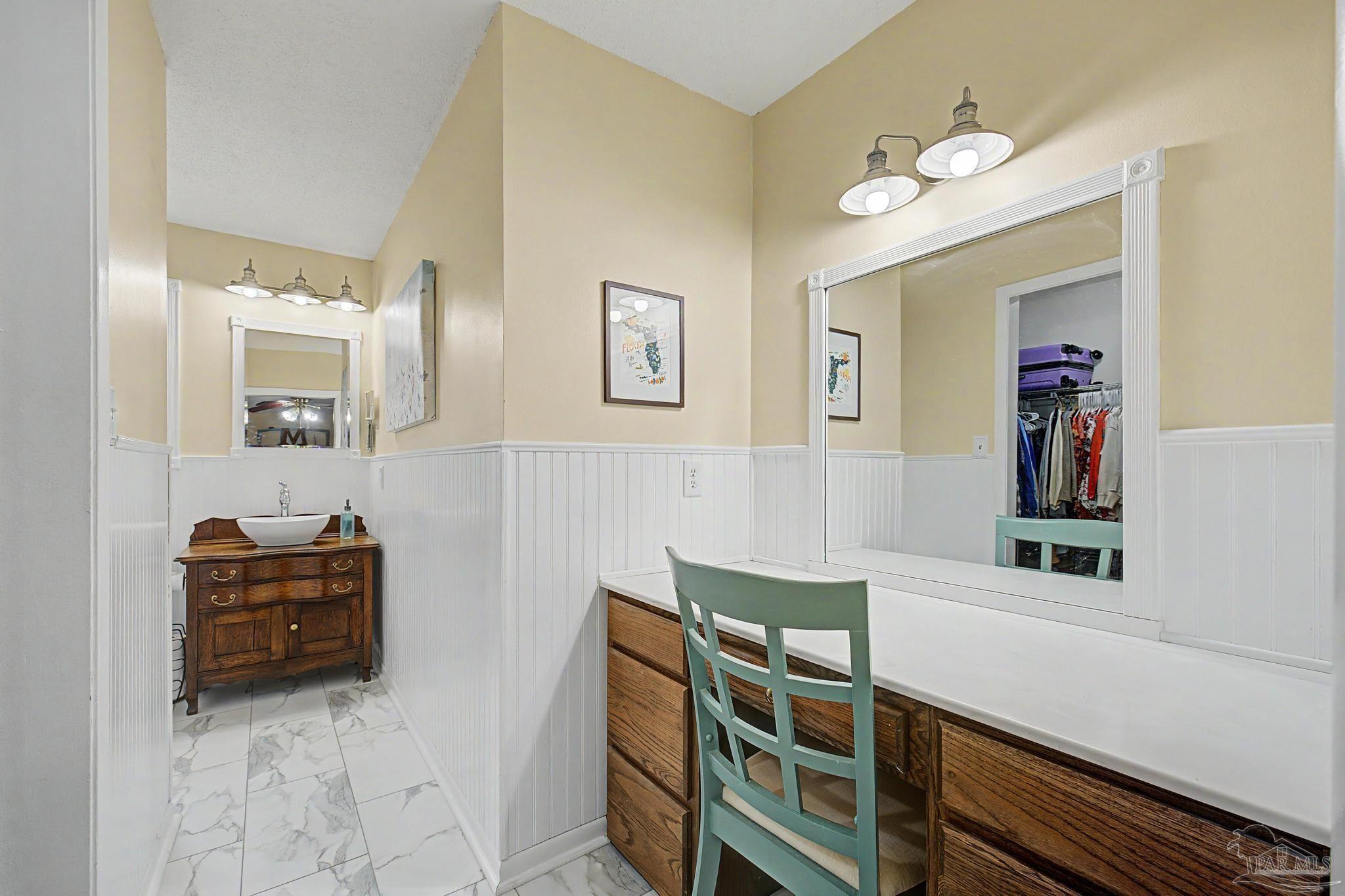 4959 Skipper Lane Pace, FL 32571 - Photo 21 of 51 a room with furniture and mirror