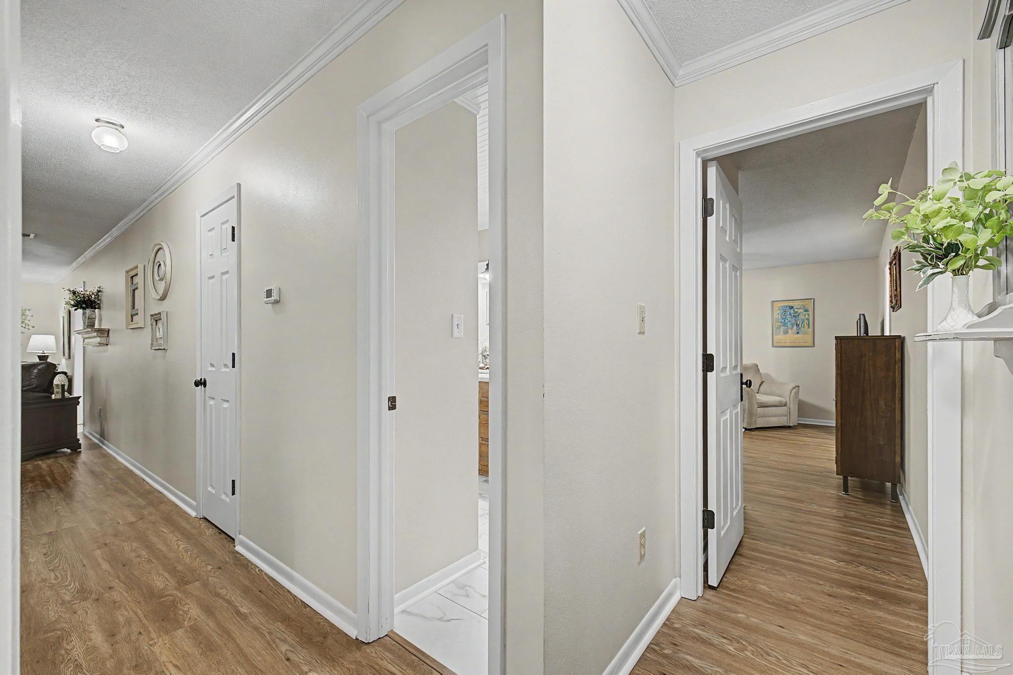4959 Skipper Lane Pace, FL 32571 - Photo 30 of 51 a view of hallway with wooden floor