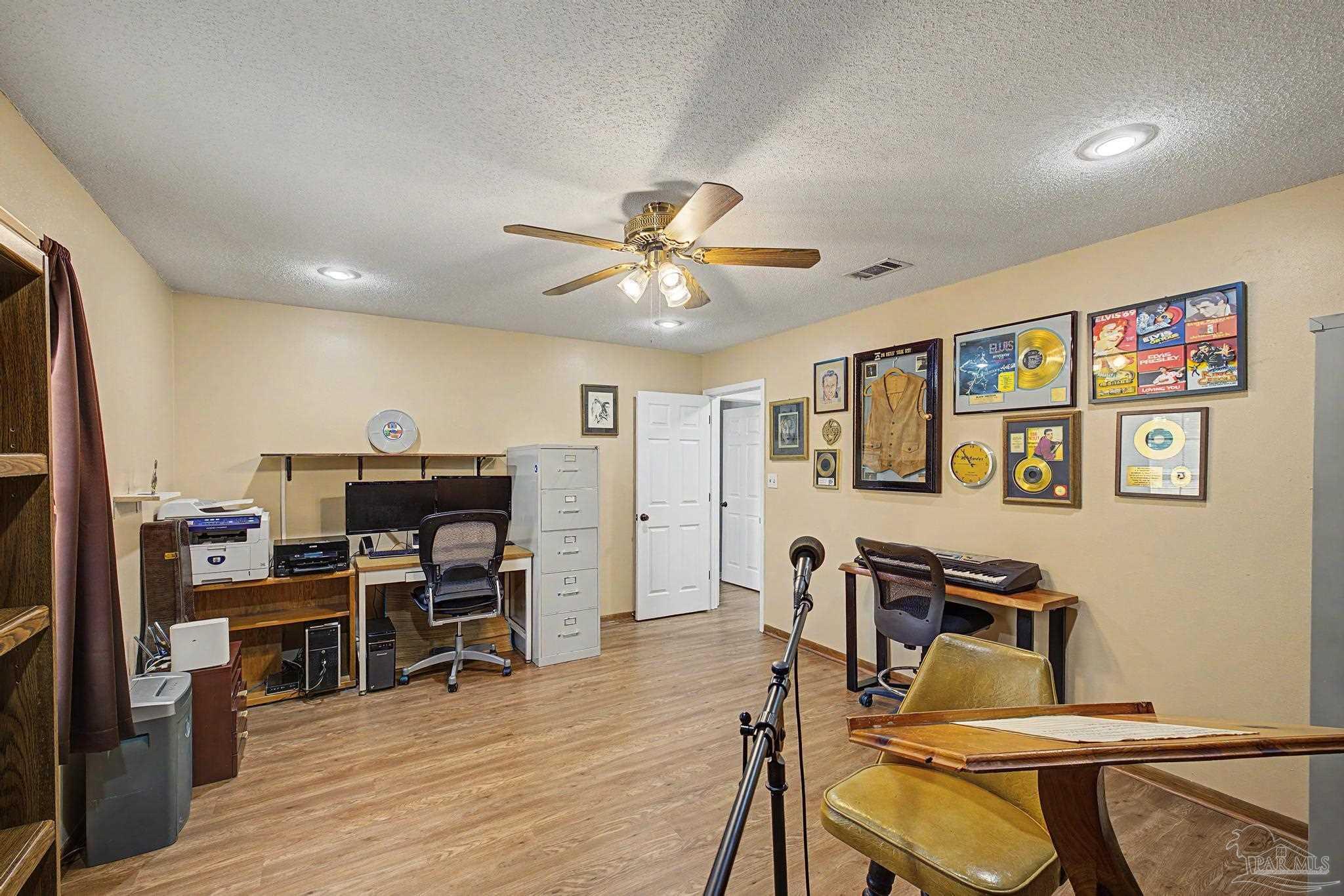 4959 Skipper Lane Pace, FL 32571 - Photo 31 of 51 a view of a workspace with furniture
