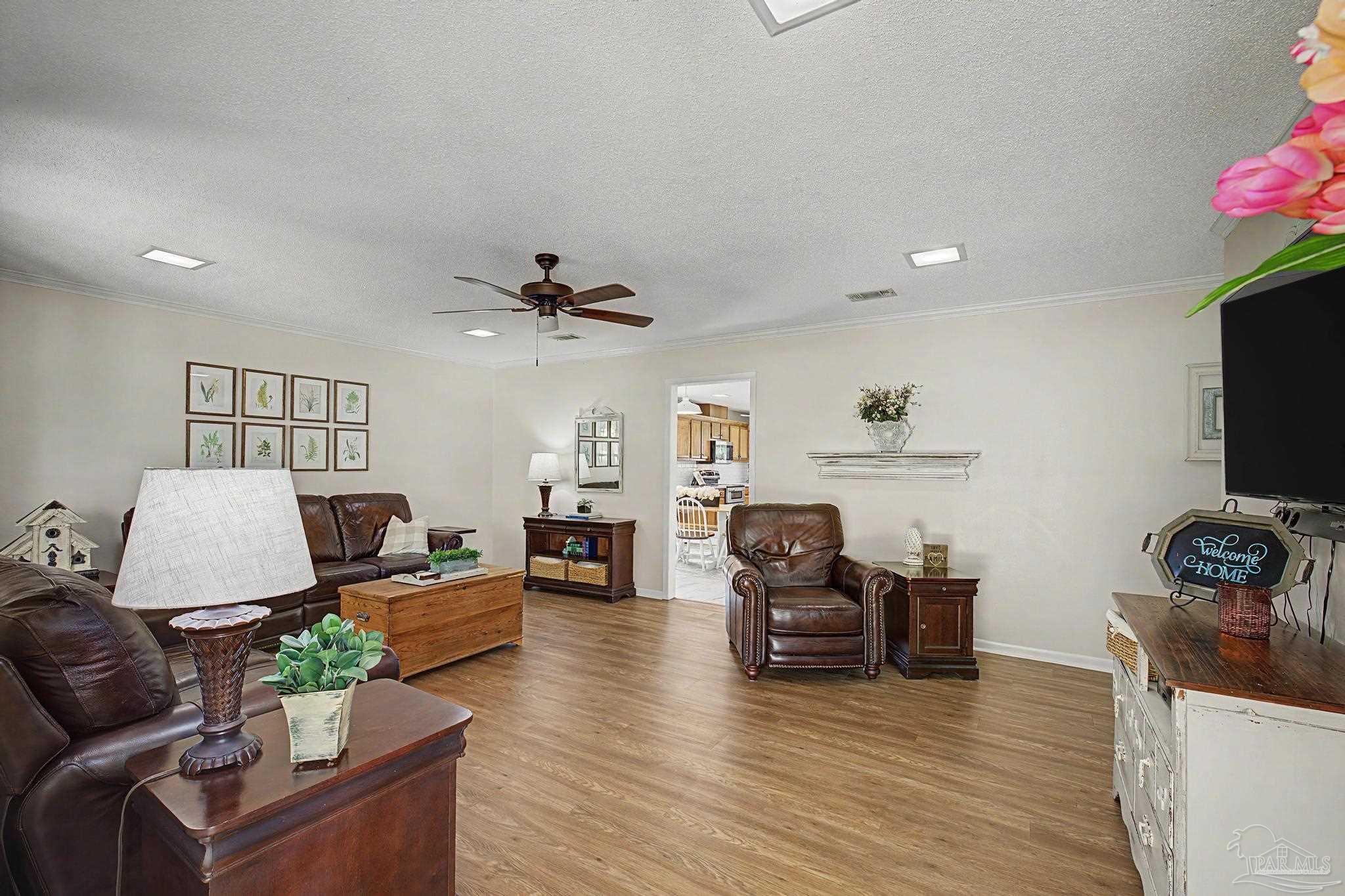 4959 Skipper Lane Pace, FL 32571 - Photo 4 of 51 a living room with furniture
