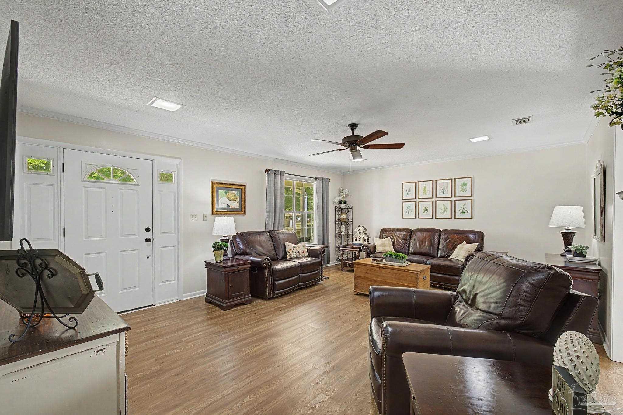4959 Skipper Lane Pace, FL 32571 - Photo 5 of 51 a living room with furniture