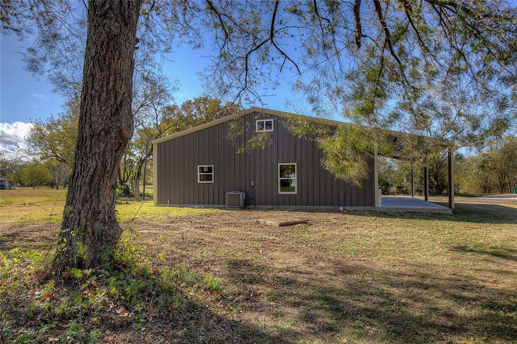 520 North 1st Street Point, TX 75472 - Photo 34 of 34 a front view of a house with a yard