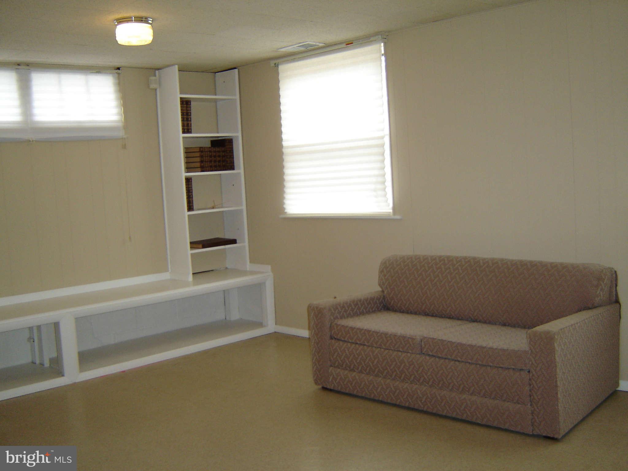 8402 Charlton Road Randallstown, MD 21133 - Photo 11 of 30 Family Room w/book shelves
