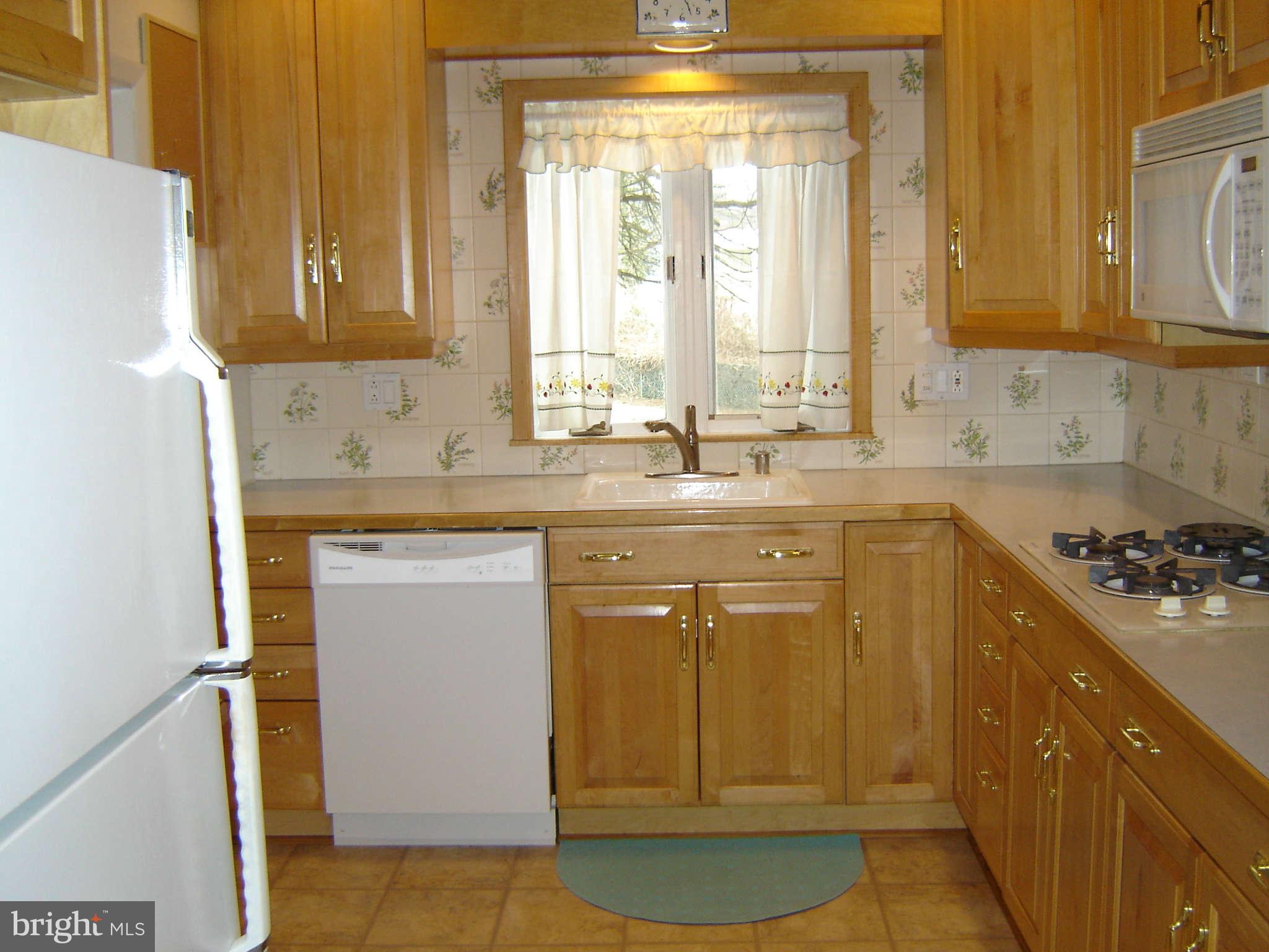 8402 Charlton Road Randallstown, MD 21133 - Photo 13 of 30 Kitchen Features Maple Cabinets