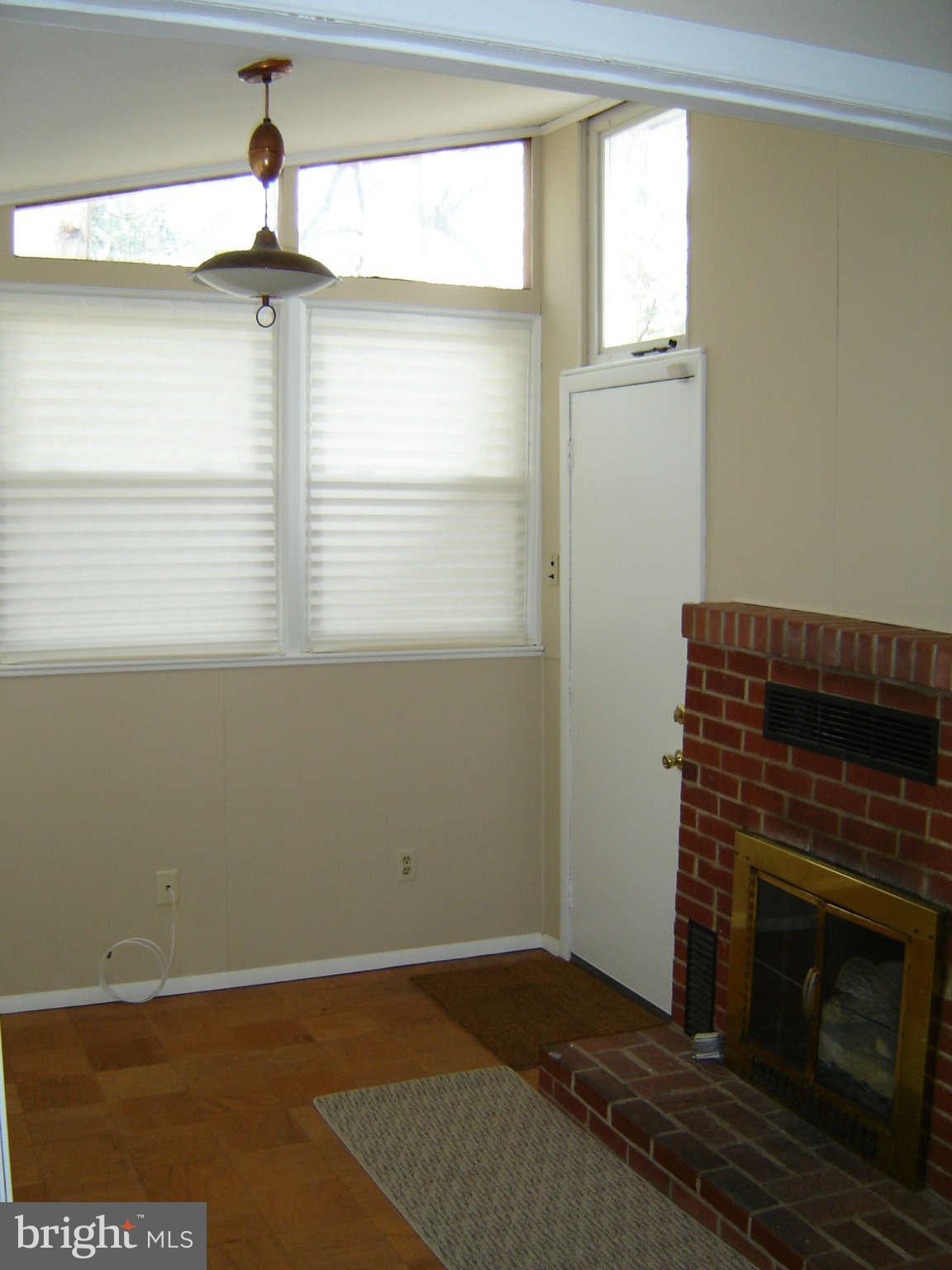 8402 Charlton Road Randallstown, MD 21133 - Photo 20 of 30 Den/Sunroom with Parquet Floor