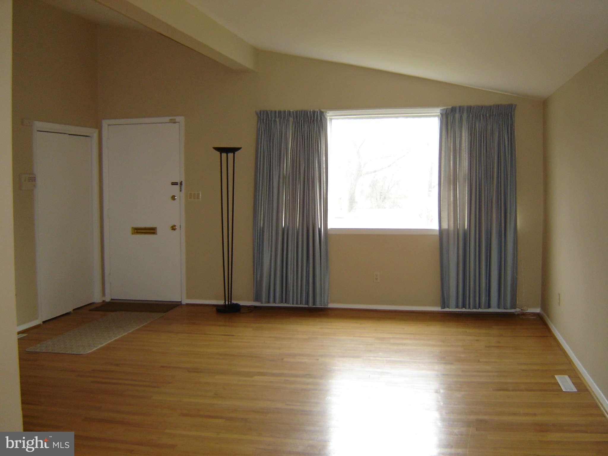 8402 Charlton Road Randallstown, MD 21133 - Photo 7 of 30 Living Room w/vaulted ceiling