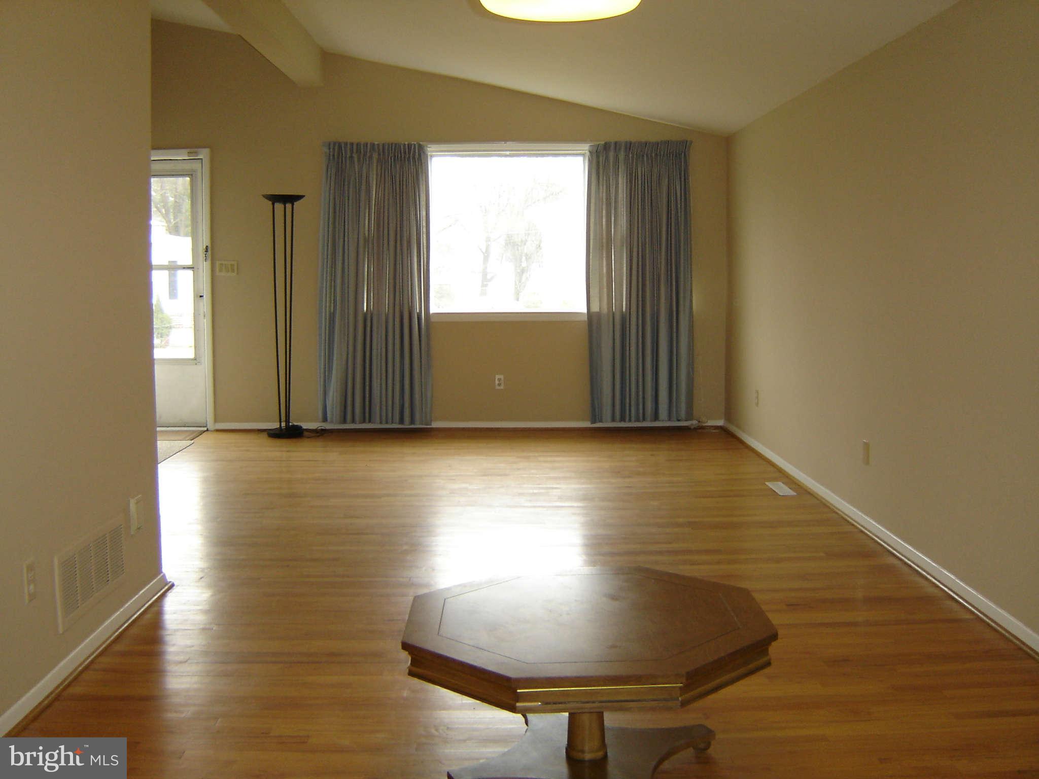 8402 Charlton Road Randallstown, MD 21133 - Photo 8 of 30 Living Room Wood Floors