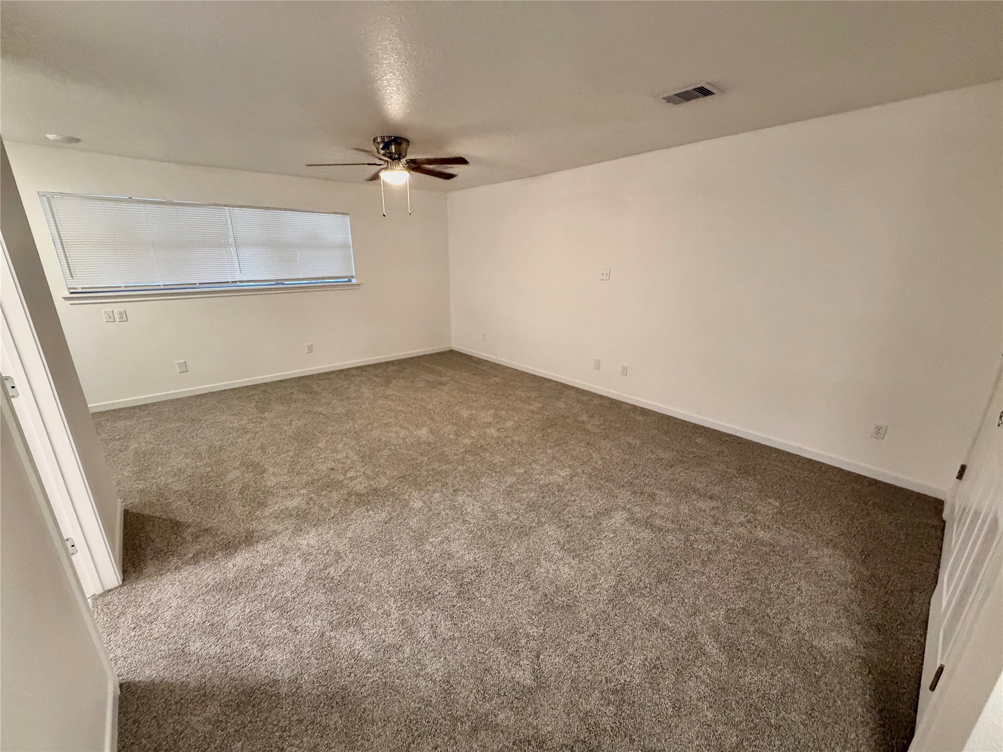 316 Angle Street Angleton, TX 77515 - Photo 16 of 30 an empty room with a empty space and windows