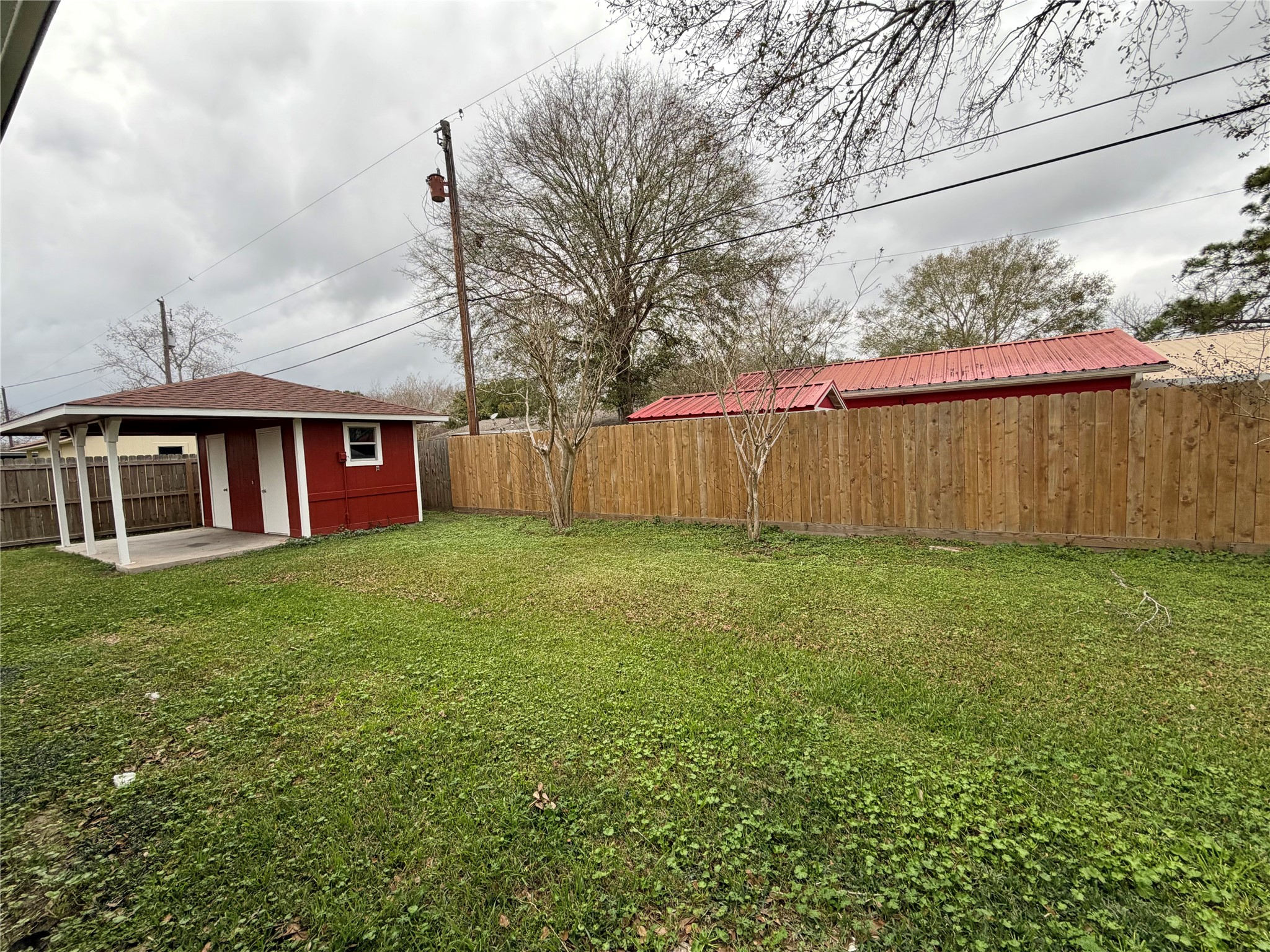 316 Angle Street Angleton, TX 77515 - Photo 28 of 30 a view of a house with a yard