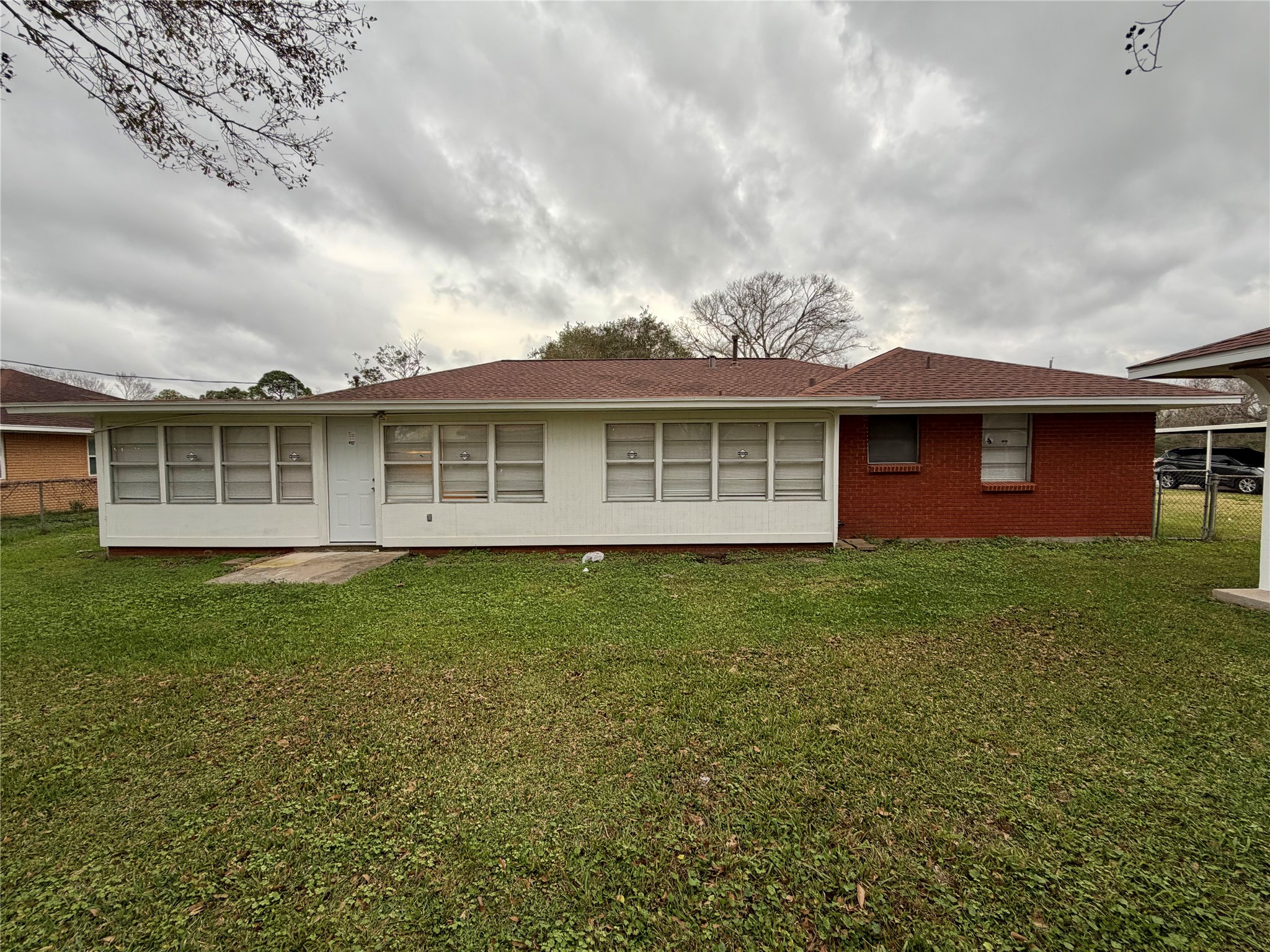 316 Angle Street Angleton, TX 77515 - Photo 30 of 30 a view of a yard in front of a house