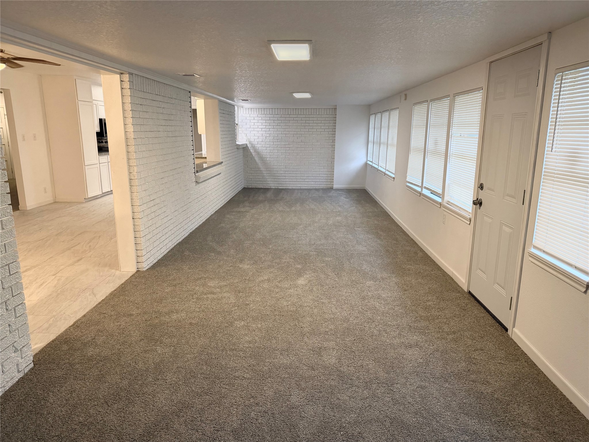 316 Angle Street Angleton, TX 77515 - Photo 10 of 30 an empty room with windows