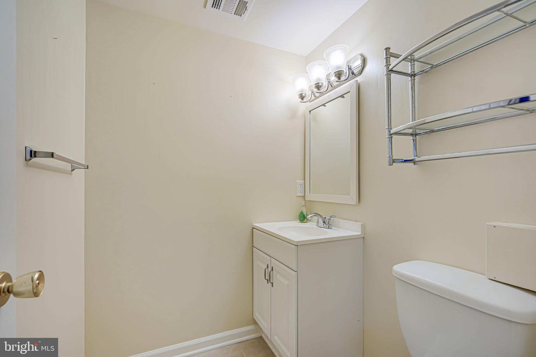 7044 Leestone Street Springfield, VA 22151 - Photo 43 of 54 Basement half bath.