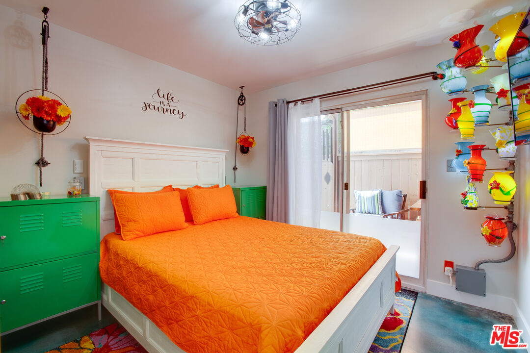 2912 11th Street, Unit 4 Santa Monica, CA 90405 - Photo 10 of 39 a bed room with a bed and a window