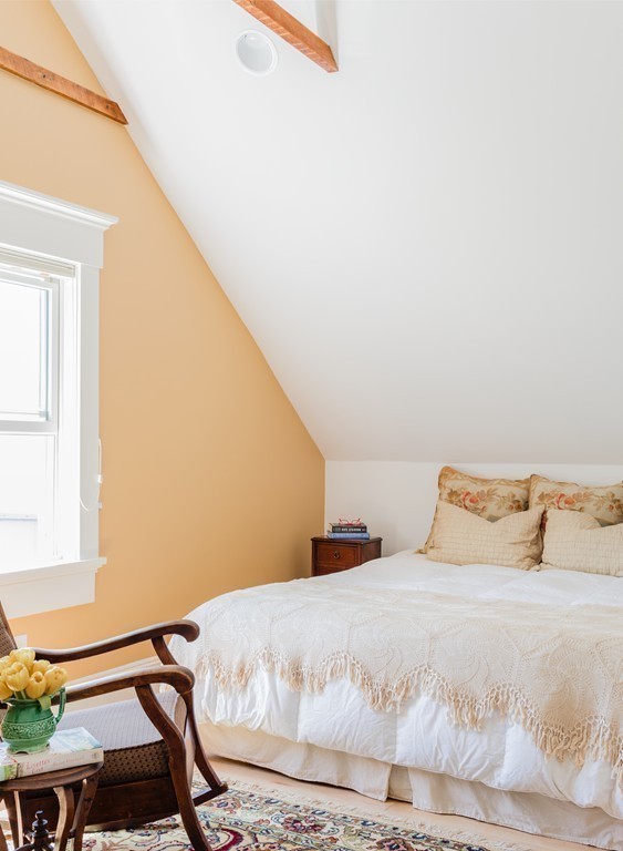 8 Vineyard Street Cambridge, MA 02138 - Photo 12 of 15 a bedroom with a bed and wooden floor