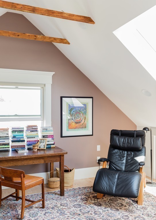 8 Vineyard Street Cambridge, MA 02138 - Photo 14 of 15 a living room with furniture and a large window