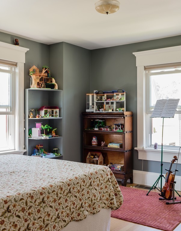 8 Vineyard Street Cambridge, MA 02138 - Photo 9 of 15 a bedroom with a bed and closet