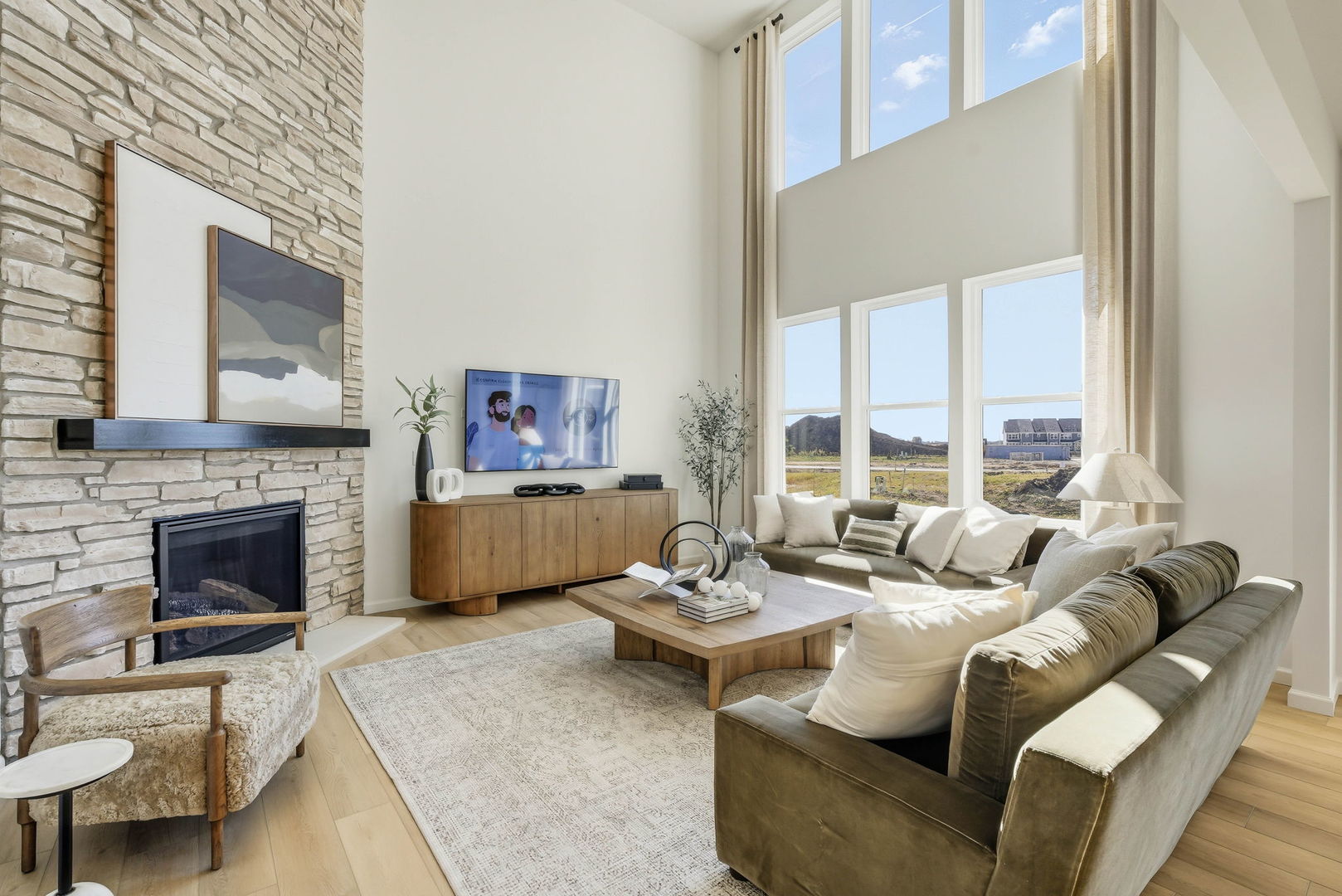 605 Redtop Way Bolingbrook, IL 60490 - Photo 8 of 22 a living room with furniture large window and a fireplace